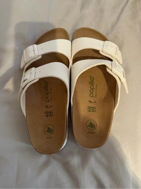 Brand new Birkenstock white platform sandals. New without tags.